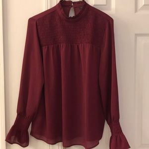 Anne Taylor Smocked neck wine colored blouse
